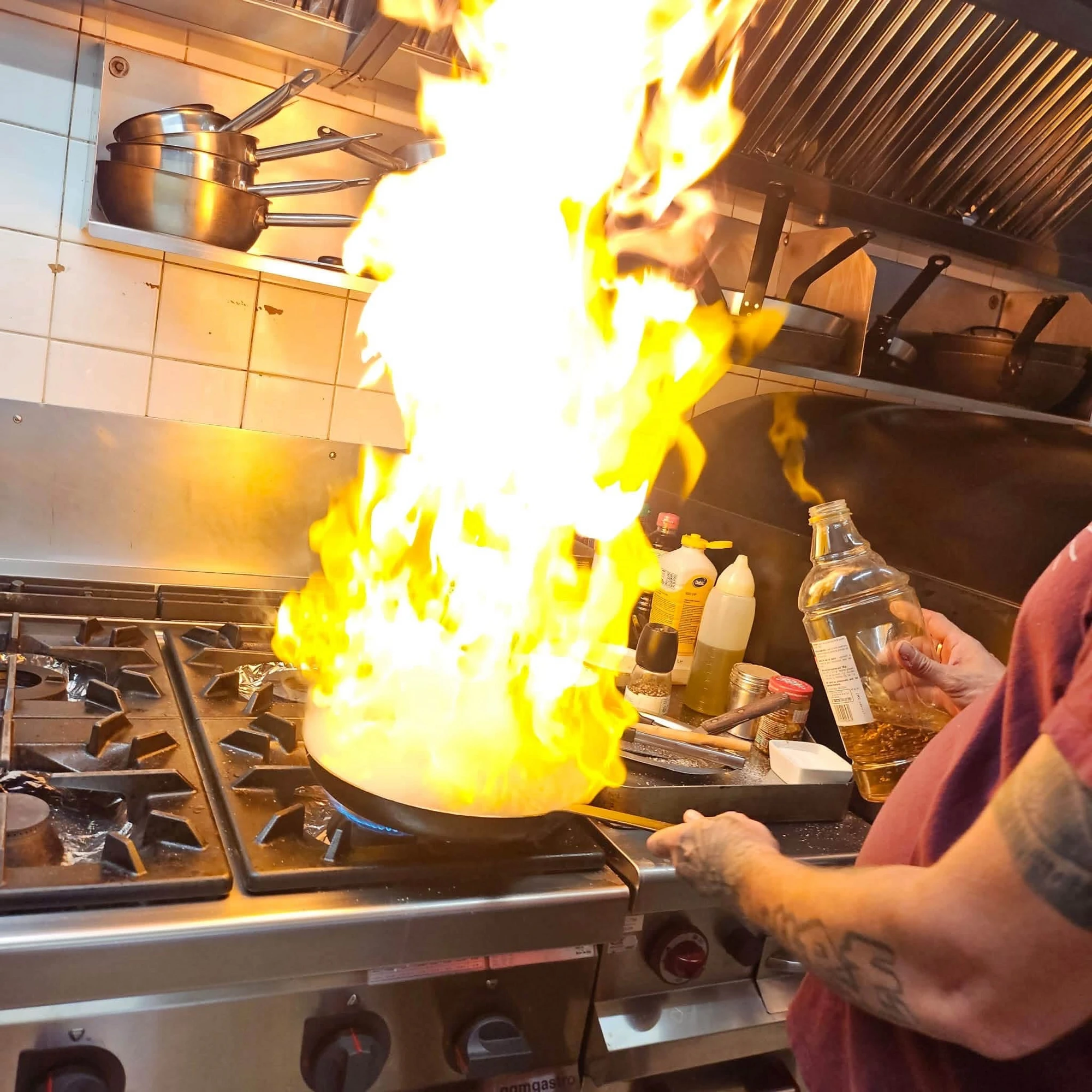 In the kitchen — the flambé